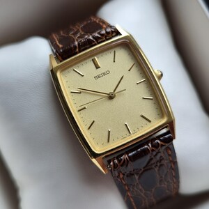 ヴィンテージ SEIKO 5E31 アイボリー文字盤 タンク 1992年製 Seiko 1992 - Etsy 日本