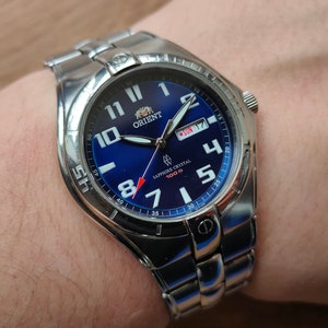 Orient Saphire Crystal quartz watch, blue watch, japan watch, day and date indicator