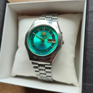 Orient crystal cheap 21 jewels green