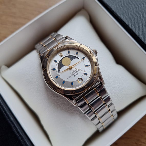 ALBA Seiko Carib Quartz Watch With Moon Phases Calendar, Small