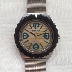 USSR Quartz watch RAKETA (ROCKET), rare watch, watch with battery, with metal bracelet raketa
