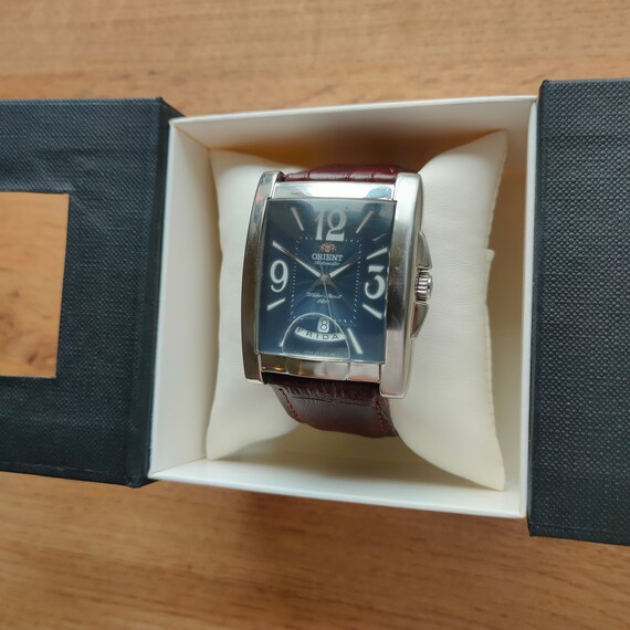 Orient tonneau watch sale