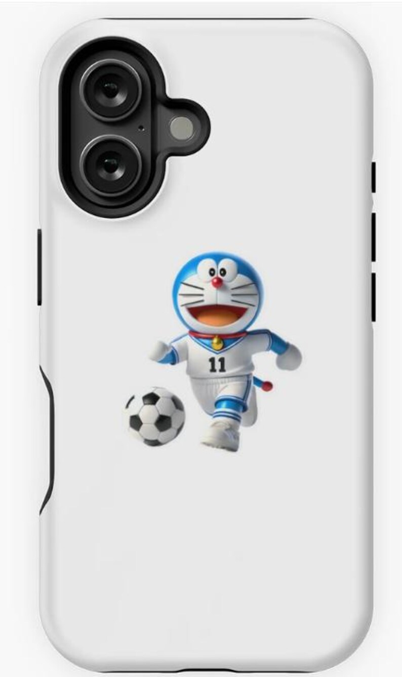 May include: White phone case featuring a cartoon character in a blue and white soccer uniform, kicking a soccer ball. The character has a blue head, red collar, and a number 11 on the uniform.