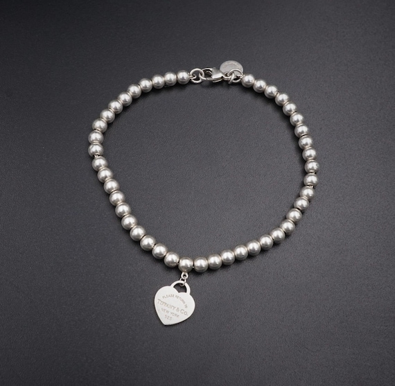 Petite Round Sterling Silver Tag
