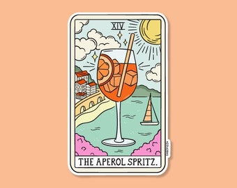May include: A tarot card illustration of a glass of Aperol Spritz with a straw, ice cubes, and an orange slice. The card is titled "The Aperol Spritz" and has the number XIV in the top right corner. The background features a cityscape, a sailboat, and a sun.