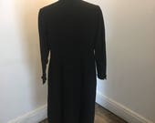 Stylish black wool crepe vintage dress.