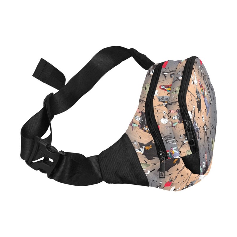 May include: A black fanny pack with a zipper closure and an adjustable strap. The fanny pack has a beige background with a colorful print of characters from the movie "The Nightmare Before Christmas".