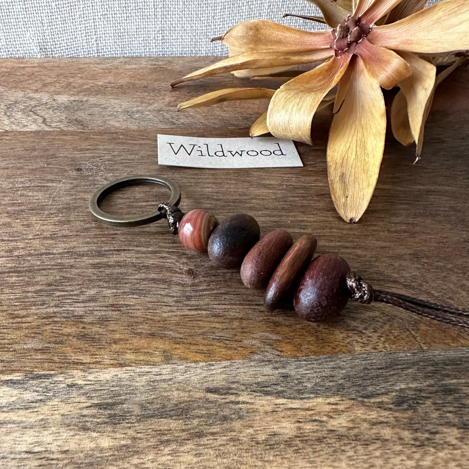Audrey's Market Geometric Wood Bead Tassel Key Chain Black
