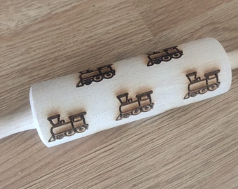 Mini rolling pin with train