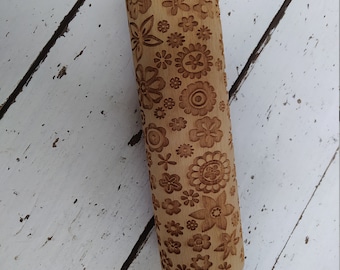 Laser engraved rolling pin with flower