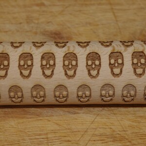 Mini laser engraved rolling pin with sculls