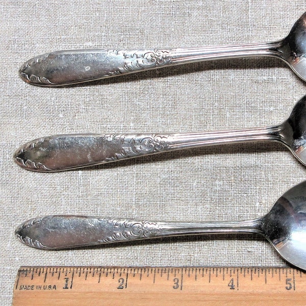 National Silver Co silver plate King Edward pattern set of serving spoons and a soup spoon in good used condition