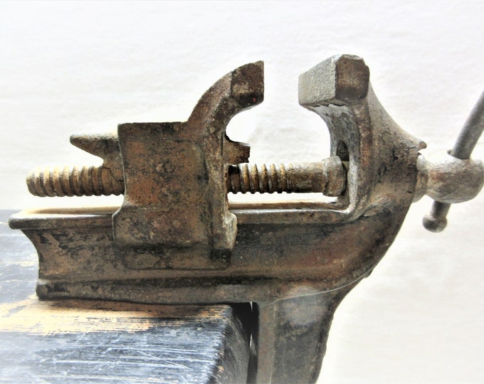 Small Bench Vise Has 2 Wide Grips and Will Expand Out Over 3. Rusty and