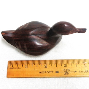 Vintage hand crafted wooden duck sculpture. Solid dense wood, 4.25" long