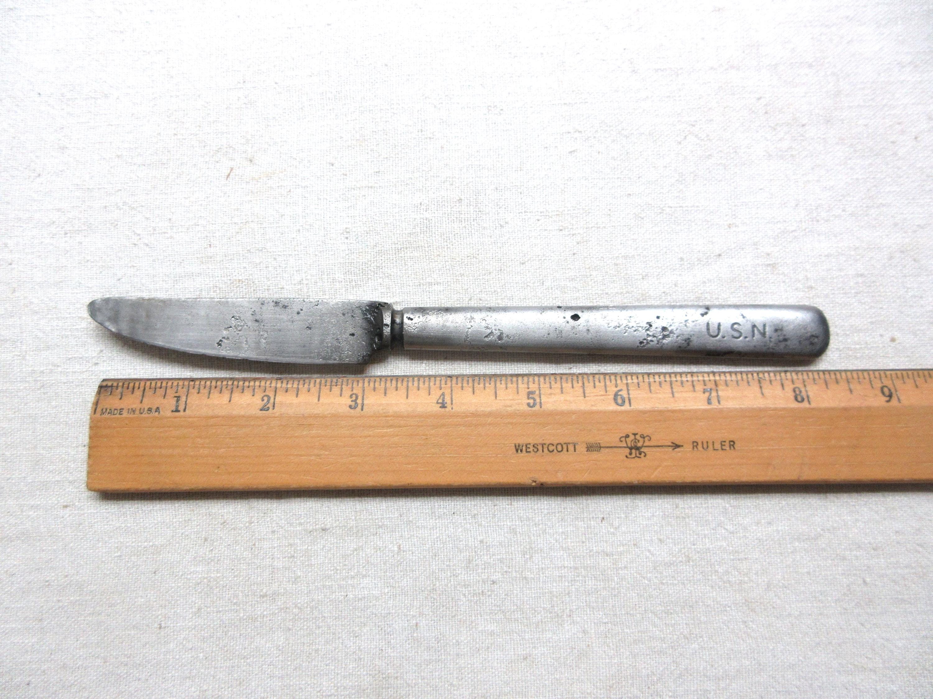 US Navy Dinner Knife. Mess hall knife is 8.25" long. USN on one side. A diamond emblem is engraved on the side. WWII era?