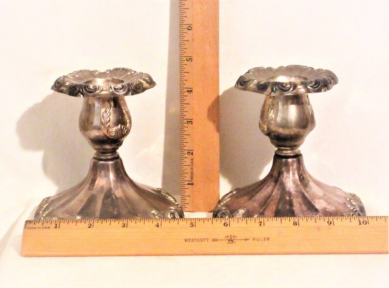 no dents. 5 diameter base Good used condition Tarnish 4.5 tall Marked Reed /& Barton Italy Vintage silver plate candle stick holders