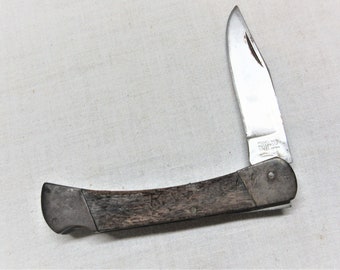 Vintage large folding single blade knife. Lockback knife marked Model 960 Japan, Rust Proof Steel blade. Folded 5&quot;. Good working order