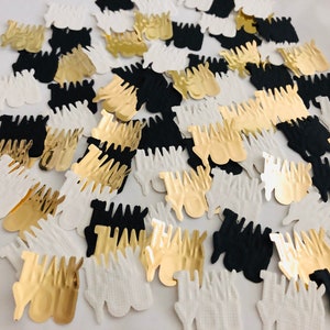 May include: Black, gold, and white confetti with the words "Thank You" printed on each piece.