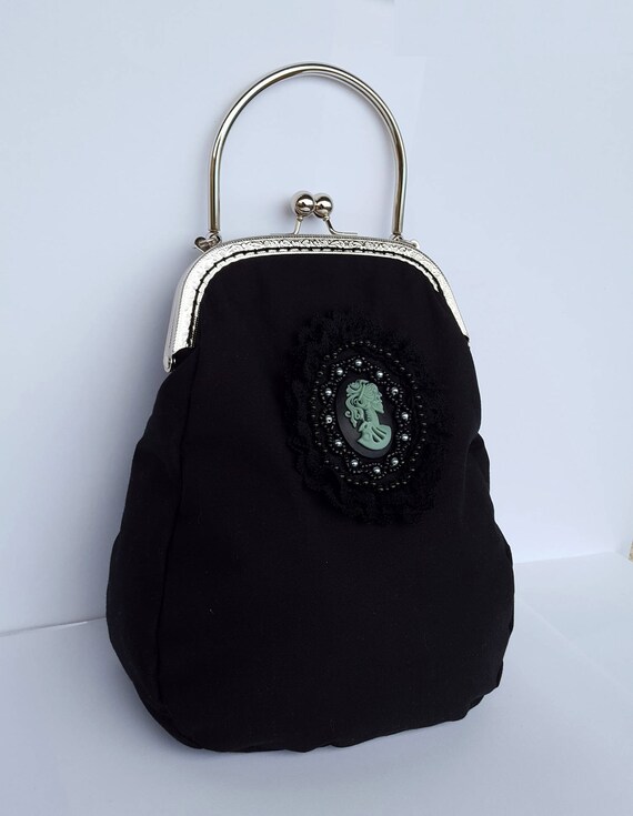 black purse with handle