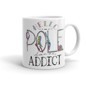 Può includere: Tazza in ceramica bianca con un contorno nero di una ballerina di pole dance e il testo "Hello I am a Pole dance addict".