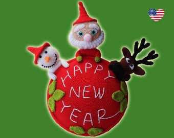 May include: A red crocheted Christmas ornament with the words "Happy New Year" in white. A crocheted Santa Claus, snowman, and reindeer are attached to the ornament.
