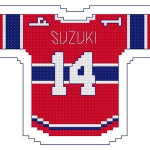 May include: A red hockey jersey with white and blue detailing. The jersey displays the name "SUZUKI" and the number "14" in white. The design is pixelated, resembling cross-stitch. The jersey has blue stripes on the sleeves.