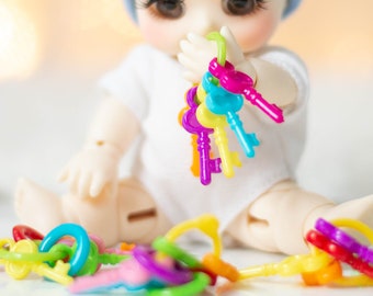 1:6 miniature baby rattle, baby toy, miniature baby accessories, dollhouse nursery, miniature baby, BJD, nappy choo, lati yellow