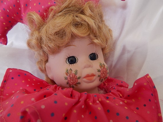 doll with red cheeks