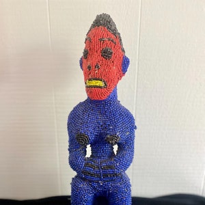 Vintage handcrafted beaded female figure sculpture from the Bamileke of Cameroon