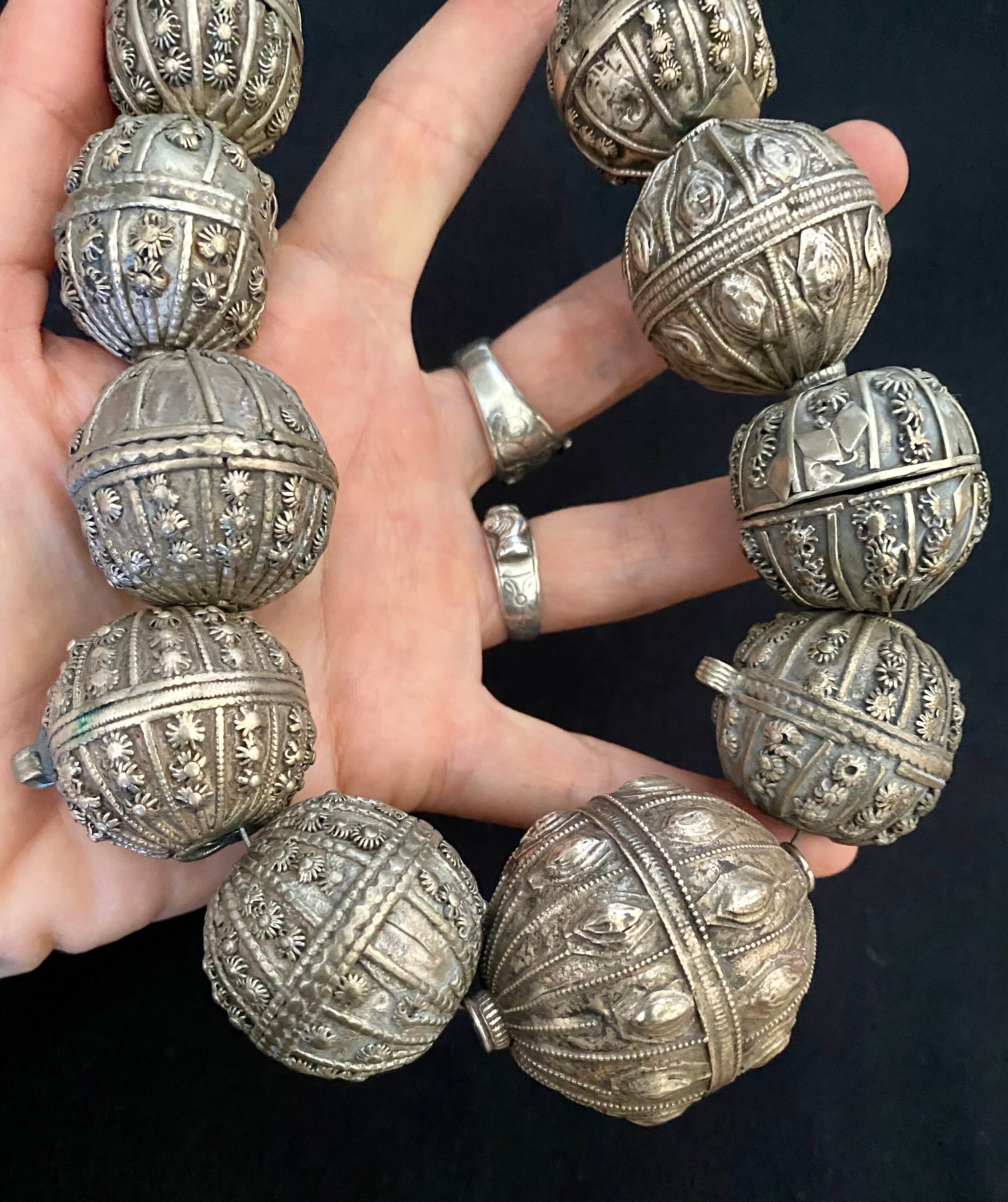 A Strand of 14 Antique Yemeni Handcrafted African Silver