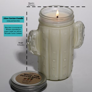May include: A 15-ounce cactus-shaped candle in a clear glass jar with a white lid. The candle is white and has a burn time of 80 hours. The jar is decorated with a cactus design and the lid has the text "What the Fucculent?!" printed on it.