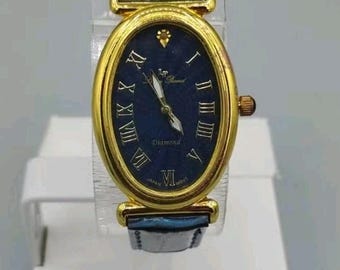 NOS Lucien Piccard Diamond Women's oval yellow gold tone watch 28177BU