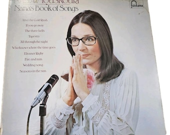 Álbum em vinil "Nana's Book Of Songs" de Nana Mouskouri, em estado quase perfeito.