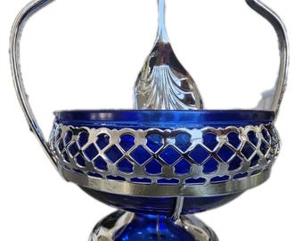 Vintage Cobalt Blue Glass Sugar Bowl Resting in Stainless Steal Basket
