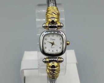 Reloj de pulsera Vivani para mujer, impresionante, con esfera de nácar en tono plata y oro, con incrustaciones.
