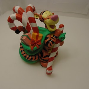 Disney Smiling Tigger Christmas Figurine Santa&#39;s Bag Candy Canes Pooh Collectors -Nice heavy piece 5 inches tall Vintage Excellent Condition