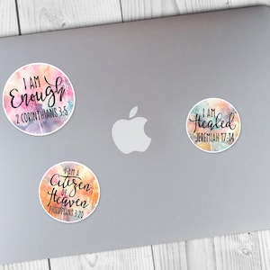 May include: Three round stickers with watercolor backgrounds and inspirational quotes. The stickers say "I am Enough 2 Corinthians 3:5", "I am Healed Jeremiah 17:14", and "I am a Citizen of Heaven Philippians 3:20".
