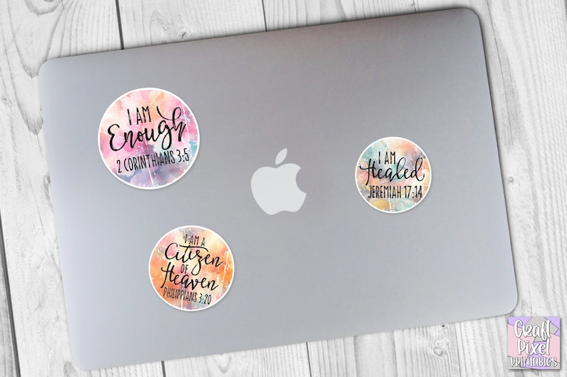 May include: Three round stickers with watercolor backgrounds and inspirational quotes. The stickers say "I am Enough 2 Corinthians 3:5", "I am Healed Jeremiah 17:14", and "I am a Citizen of Heaven Philippians 3:20".