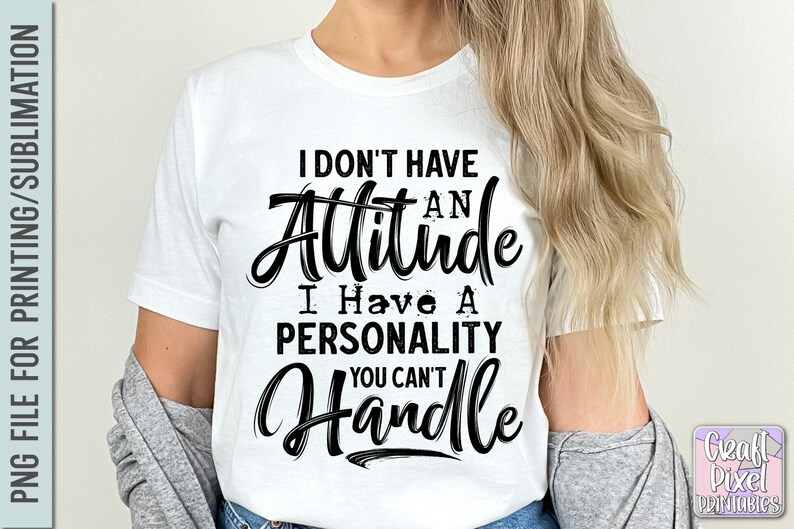 Puede incluir: Camiseta blanca con el texto negro: "I DON'T HAVE AN Attitude I Have A PERSONALITY YOU CAN'T Handle". El dise&ntilde;o es un archivo PNG para impresi&oacute;n o sublimaci&oacute;n. El texto est&aacute; en una fuente de escritura.