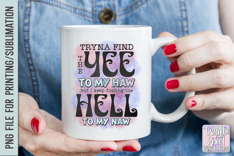 May include: White ceramic mug with the text "Tryna find the yee to my haw but I keep finding the hell to my naw" in black lettering. The text is set against a watercolor-style background with pink and purple hues.
