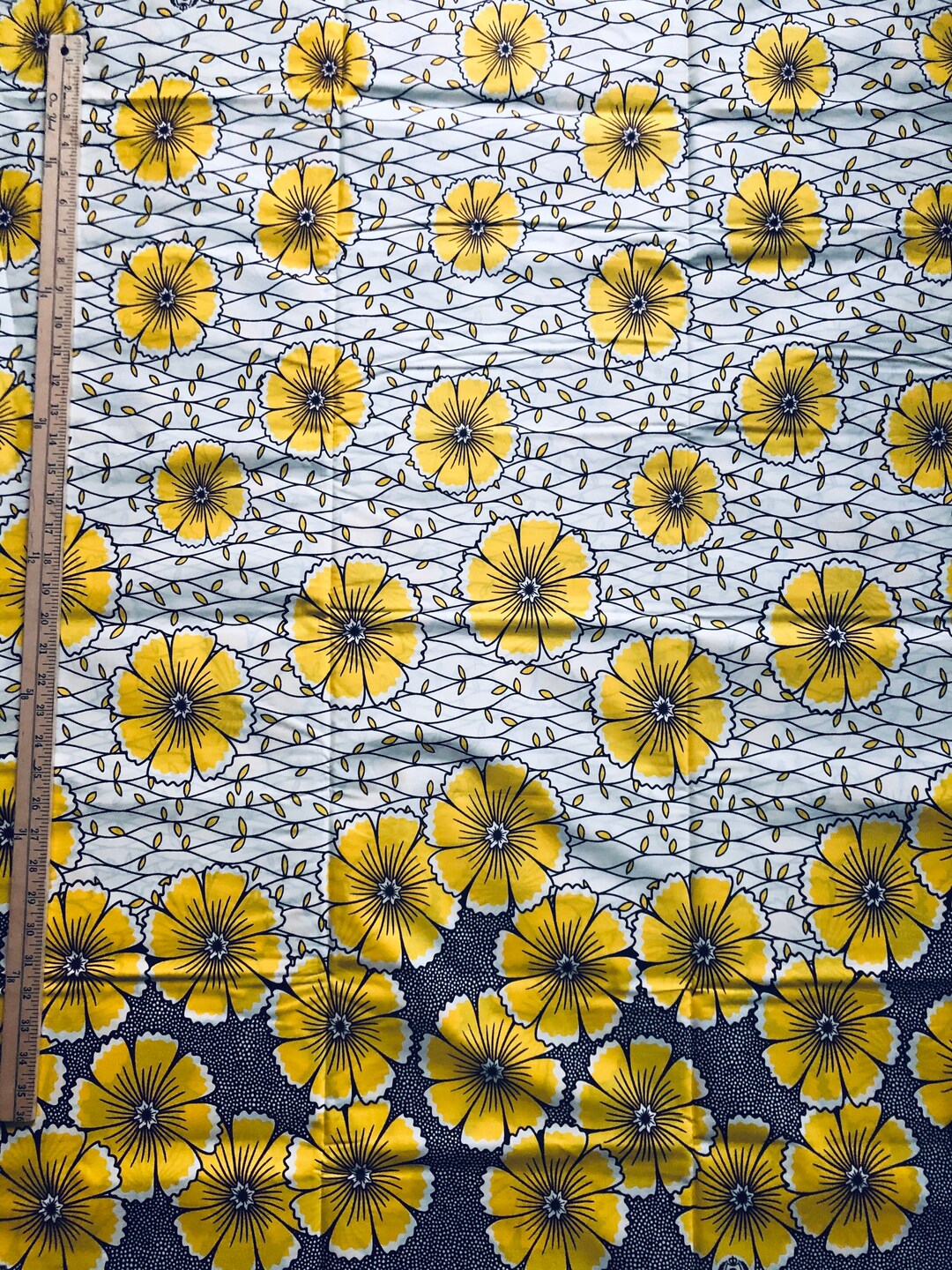 Red and Yellow Geometric Ankara Wax Print Fabric with Ornamental Design