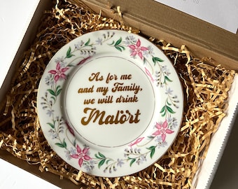 Plato floral de la familia Malört con blasfemias plateadas