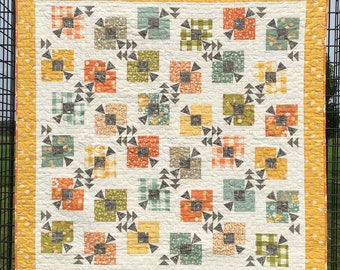 Quilt for sale, “Corn Maze” is a contemporary style quilt pieced with a combination of modern style fall colors.