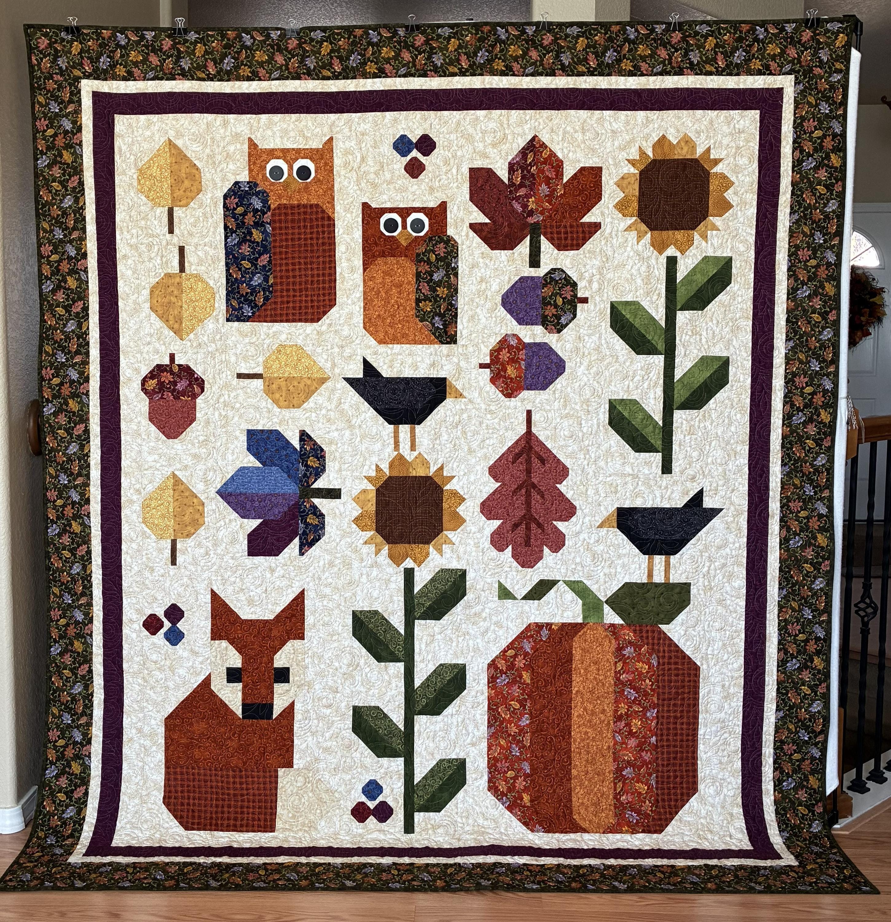 Autumn sampler quilt, fall leaves, sunflowers, blackbirds, owls, pumpkin, acorns and a fox, fall col