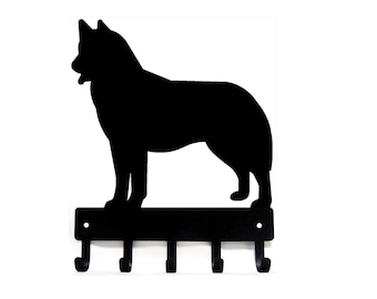 May include: Black metal key holder shaped like a husky dog silhouette with five hooks.