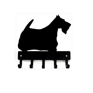 May include: Black metal key holder shaped like a Scottish Terrier silhouette with five hooks.