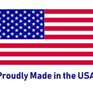 May include: A red, white, and blue American flag with 13 horizontal stripes and 50 white stars on a blue field. The text "Proudly Made in the USA" is printed below the flag.