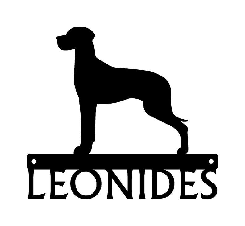 May include: Black silhouette of a Great Dane dog standing on a metal sign with the name Leonides.