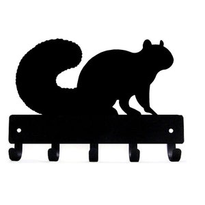 May include: Black metal squirrel key holder with five hooks. The squirrel is in a sitting position with its tail curled around its body.