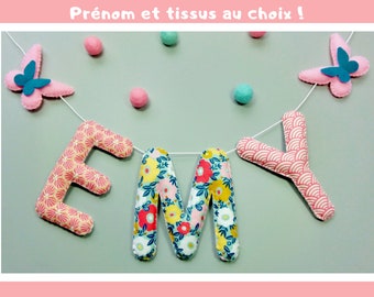 Baby-Vornamensgirlande mit Stoffbuchstaben für ein personalisiertes Geschenk zur Geburt eines Kindes